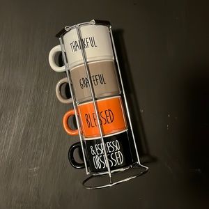 Set of four espresso cups with metal rack